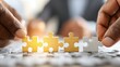 © Pixelbiz - Business people company teamwork collaboration puzzle jigsaw concept. Business Team Discussing Strategies Using Puzzle Pieces to Illustrate Collaboration and Problem Solving