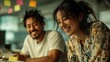 © svastix - Two happy friends collaborating in a modern office, sharing ideas and laughter while surrounded by colorful sticky notes, reflecting teamwork and positive energy.