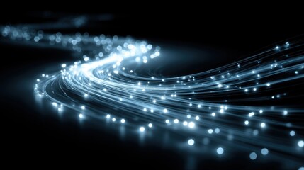 Fototapete - A mesmerizing display of swirling blue lights illuminates a dark backdrop, creating an ethereal pathway that evokes a sense of movement and energy.