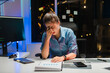 © Kritdanai - Stressed Woman Working Late at Night