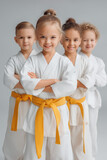 The studio shot of group of kids training karate martial arts