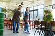 © zinkevych - Man and woman waiters celebrating at restaurant