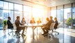 © Olga Gorkun - Business meeting in glass office with sunrise view highlighting corporate culture and collaboration themes