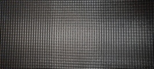 Poster - Intricate Cut Glass Texture Showcasing Geometric Patterns in a Modern Design Environment