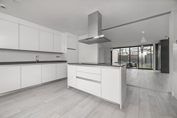 Aufkleber - The image of a modern kitchen often evokes clean lines, handleless surfaces