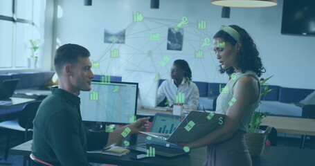 Poster - Professionals collaborating at desk in office, reviewing data visualization on monitor and laptop