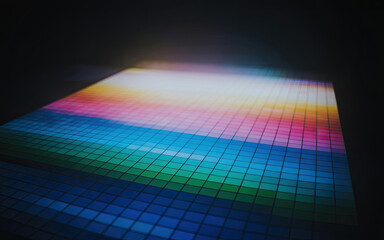 Poster - Abstract colorful mosaic gradient in a dark environment displaying a palette of vibrant hues and tones