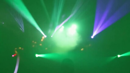 Poster - Hypnotic Lights Dance: Dynamic beams of green and purple light create an entrancing spectacle, igniting a vivid atmosphere, evoking a sense of energy.