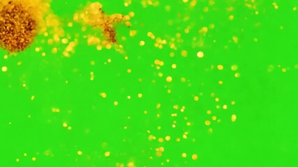 Poster - Golden Particles Dance: A captivating dance of shimmering, golden particles suspended in the air against a vibrant green backdrop, evoking a sense of magic.