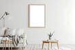 © Aitfatoul - Blank picture frame mockup on white wall. White living room design. View of modern scandinavian style interior with artwork mock up on wall. intérieur, minimal, designe, photo, encadrement,