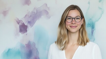 Aufkleber - Happy young woman with glasses in serene indoor setting
