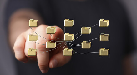 Poster - Person interacting with a network of digital folders, representing data management and connectivity.