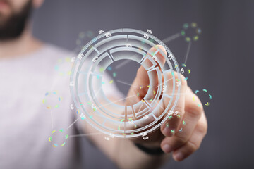 Poster - A person interacts with a holographic display showing data analysis and infographics.