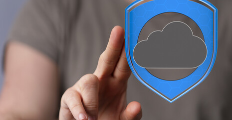 Poster - Image depicts hand interacting with a digital shield protecting a cloud, symbolizing secure cloud data.