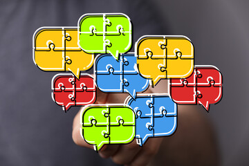 Poster - Illustrates teamwork, problem-solving, and communication through puzzle pieces in speech bubbles.