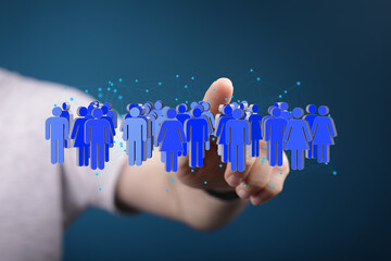 Leinwandbilder - Image depicting a hand interacting with a digital network of people, symbolizing global connection and community.