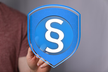 Poster - Secure your data with robust legal protection.  Digital shield graphic.