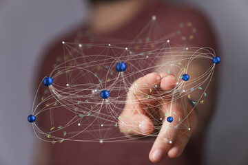 Leinwandbilder - Person interacting with a digital network.  Illustrates connection, communication, and technology.