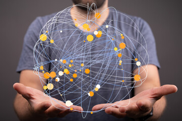 Poster - A man's hands hold a digital sphere, visualizing global network connections and data flow.