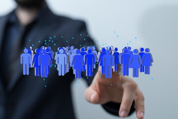 Poster - Image depicts a hand interacting with a network of digital people, symbolizing global connections and community.