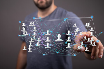 Leinwandbilder - Image of a man interacting with a digital network visualization, showing interconnected people.