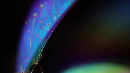Fototapete - Blue liquid edge on dark background, smooth motion 