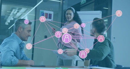 Poster - Collaborating colleagues analyzing network diagram in conference room, with flip chart and tablet