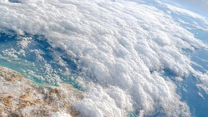 Poster - Aerial View of Cumulus Clouds: A breathtaking aerial perspective reveals a vast expanse of fluffy cumulus clouds.