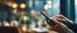 © Ruslana - The smartphone in a cozy cafe setting showcasing modern communication and lifestyle.