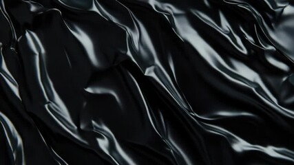 Poster - A close-up shot of a black cloth with folds and creases