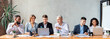 © Prostock-studio - Business And Teamwork. Happy Coworkers Working Together Discussing Project Sitting At One Desk Using Laptops In Modern Office. Panorama