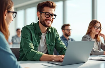 Poster - Group of business people meeting. Man types on laptop in office while others listen. Team discussion. Entrepreneurs work on tech project, using modern computer tech, happy smiling faces.