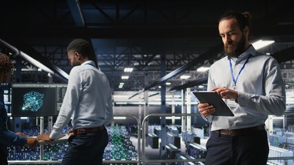 Poster - Server room technician next to coworkers reviewing neural network code and LLM visualization dashboards. Data center IT specialist next to colleagues monitoring AI system performance,