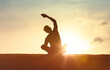 © kieferpix - Young man stretching and practicing yoga at sunrise. Recreation, self care, yoga training, fitness,  exercises,  relaxation, healthy active lifestyle concept