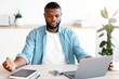 © Prostock-studio - Coping With Working Stress. Portraif Of Calm Black Man Meditating At Workplace In Modern Office, Practicing Yoga, Young African American Entrepreneur Sitting At Desk With Closed Eyes While, Free Space