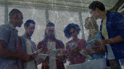 Poster - Asian man stepping forward showing tablet while business team discussing charts, reaching consensus