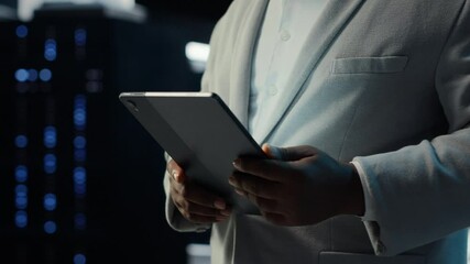 Poster - IT professional in server hub ensuring valuable data remains shielded from potential threats using tablet. Worker safeguarding data center against unauthorized access and vulnerabilities, camera B