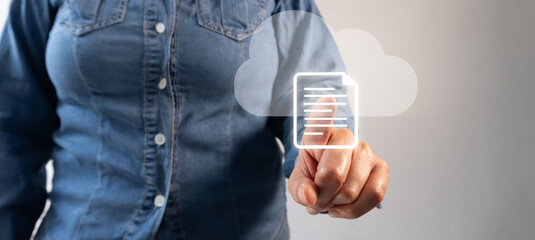 Poster - A woman touching the virtual touch screen of a cloud documents icon with her finger, against a light gray background.