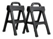 © OMD - A foldable sawhorse pair made from durable plastic, convenient for supporting materials in a backyard shed.