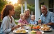 © hao - Multi generation family having bbq party outside in the backyard on patio. High quality