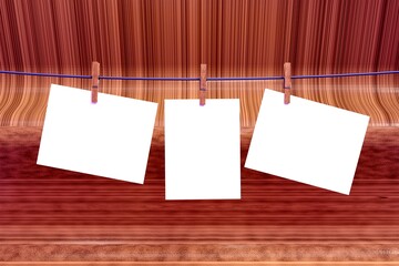 Poster - Mockup hanging white blank space card, for greeting, Name list, Photo show at wedding ceremony with clipping path, on rope isolated on wood background