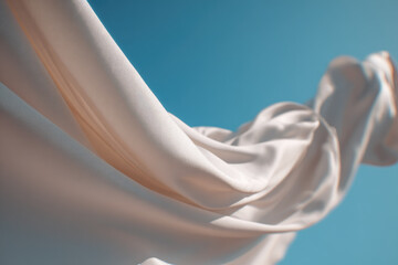 Aufkleber - Soft white fabric flapping gently in slow breeze against clear blue sky, creating dreamy and peaceful atmosphere with smooth texture and delicate movement