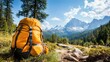 © svastix - This captivating image features a vibrant yellow backpack resting on the ground, surrounded by lush greenery and majestic mountains, symbolizing adventure and exploration.