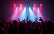 © fu - A crowded concert hall with scene stage lights, rock show performance, with people silhouette. High quality