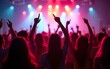 © fu - Young people cheer and dance joyfully at a lively music festival, surrounded by bright, colorful lights in an energetic atmosphere. The excitement fills the air as they enjoy the moment. High quality
