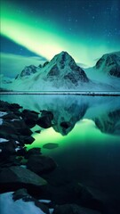 Wall Mural - a mountain range is reflected in the water. the water is green and the sky is blue. the mountains ar