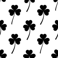 Poster - Seamless pattern of black shamrocks on a white background for st patrick's day celebration design