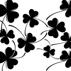 Poster - A pattern of black shamrocks with stems on a white background creating a st patrick's day theme