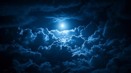 Wall Mural - full moon shining through dark, dramatic clouds at night.