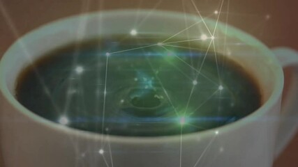 Poster - Droplet dropping in coffee cup starting ripples and network overlay pulsing showing connectivity